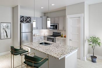 Modern kitchen with a large island and barstools